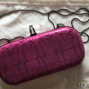 Marchesa clutch with removable metal rope strap